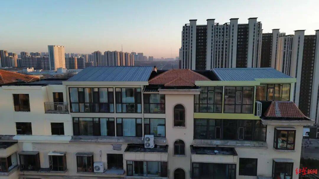 山西一小区被曝多个顶楼住户违规加盖房屋：有的甚至修建成阁楼<strong></p>
<p>看币圈</strong>，致几十户房子墙面裂缝